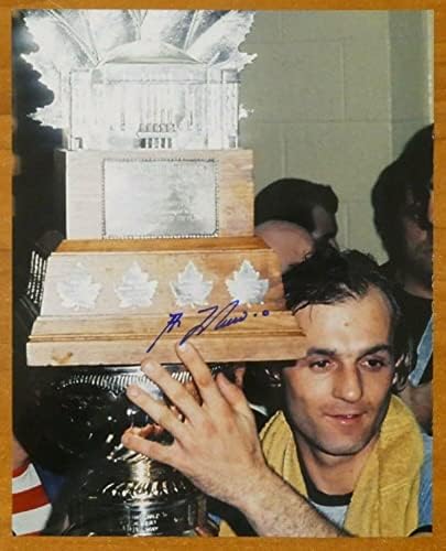 גיא לפלור חתום על 8x10 הוקי צילום - תמונות NHL עם חתימה